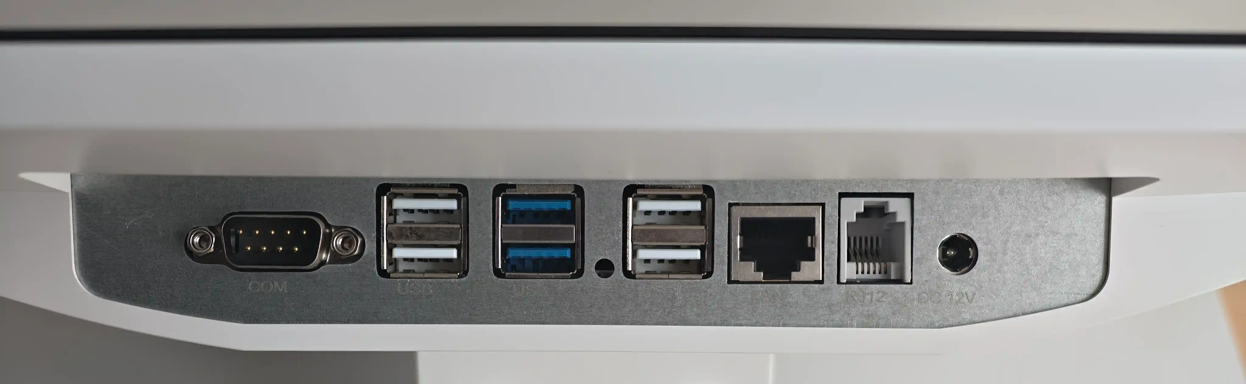 Back view of the SUNTEK SC6 POS system's interface panel, showing multiple I/O ports including a Serial (COM), 6 USB ports, LAN, and a dedicated RJ12 cash drawer port for comprehensive peripheral compatibility.